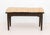 Mid-Century Modern Tonkbench Wooden Piano Bench, circa 1940, with beige upholstered cushion and the top lifting to storage...