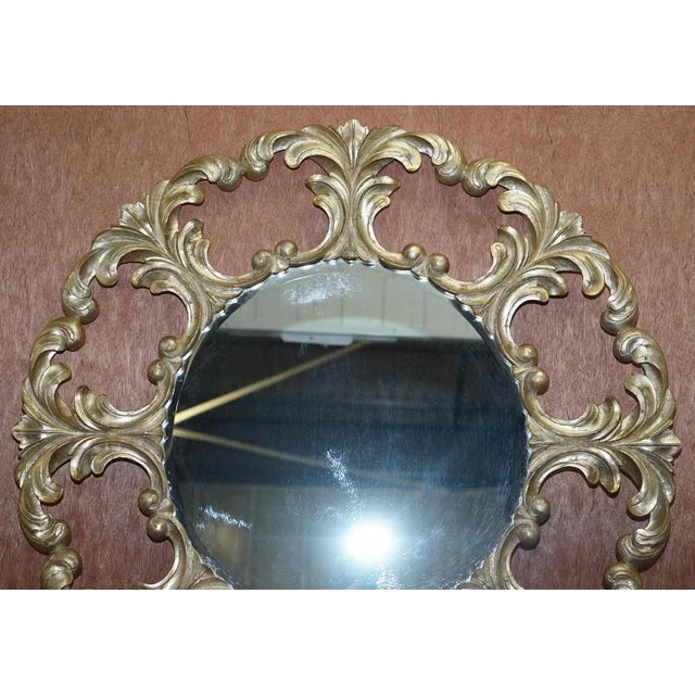 We are delighted to offer for sale 1 of 2 Original Christopher Guy gold and silver leaf wood round wall mirrors This is...