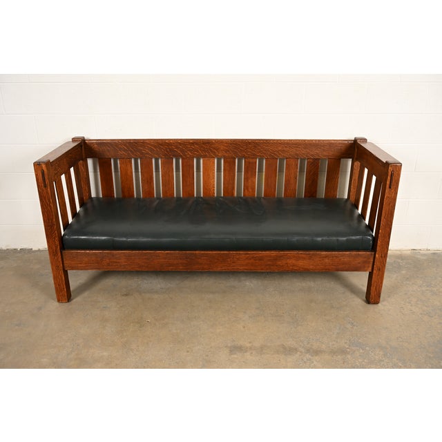 A beautiful antique Mission or Arts & Crafts period settle sofa or bench In the manner of Stickley By Harden Furniture...
