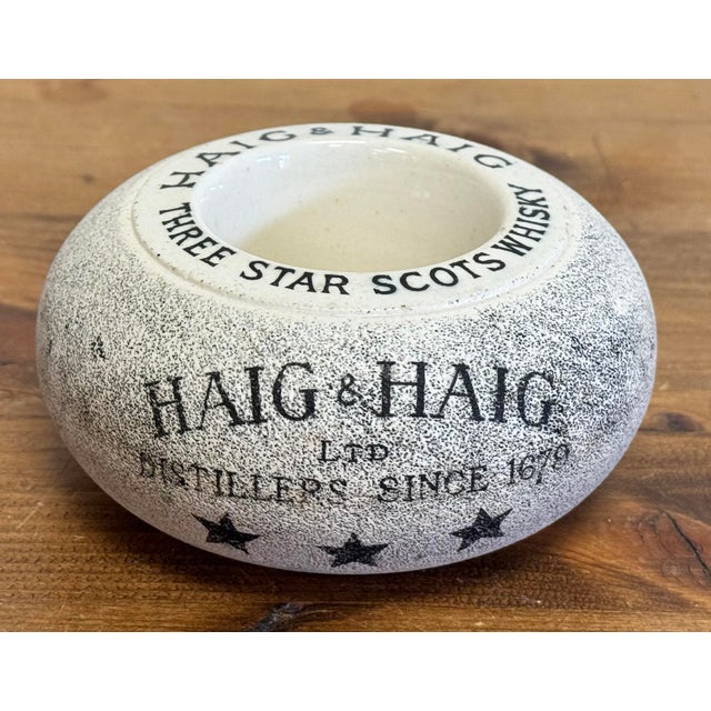 Vintage English Haig and Haig Scots Whiskey match striker. Maker's mark on underside. Age wear.