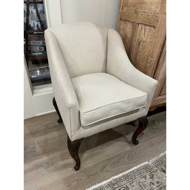 Pair of 19th c French chairs . Carved beautiful wood legs . Upholstered in Belgium linen .