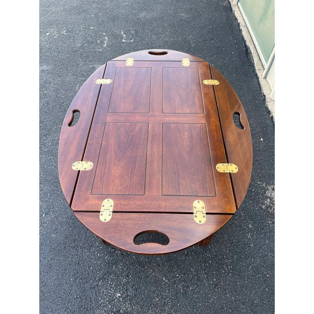 A mid-20th century butlers tray table made by renowned American furniture manufacturer, Drexel. This tray table is in a...