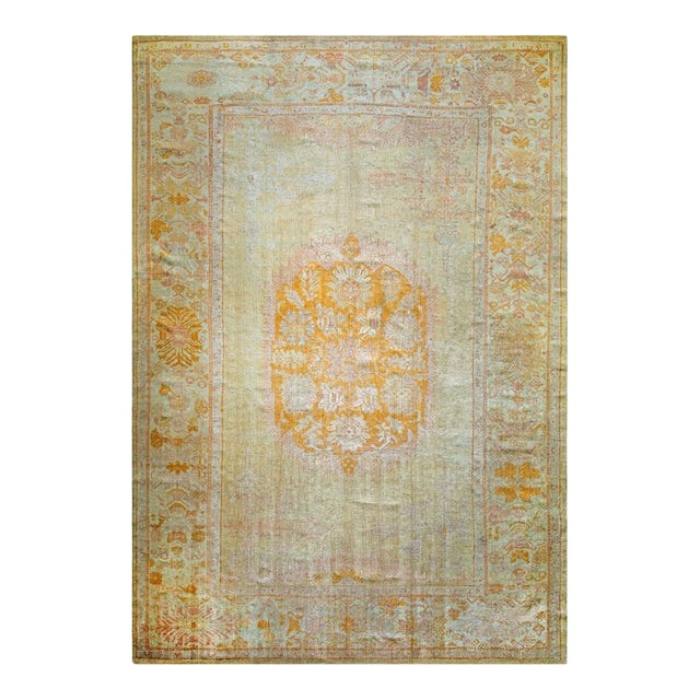 1890s Ivory Large Open Field Antique Turkish Decorative Medallion Oushak Rug For Sale