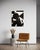 Afterparty is painted with oil on canvas and uses a vocabulary of geometric shapes that combine and create new and...