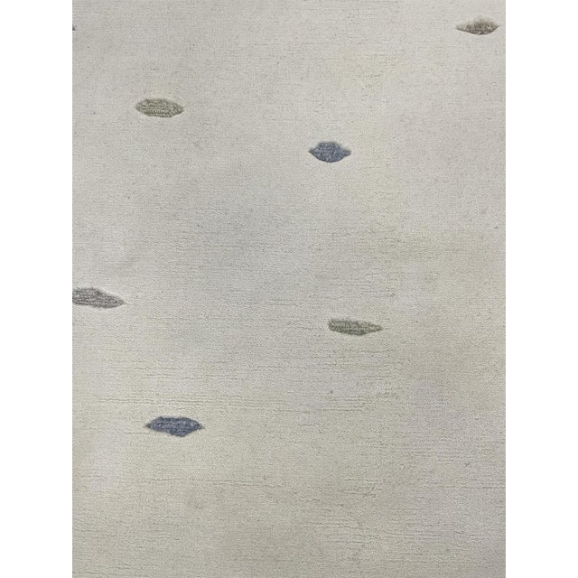 Beautiful hand knotted modern rug. Made of 75% wool and 25% cotton with very modern design and colors, this extremely...