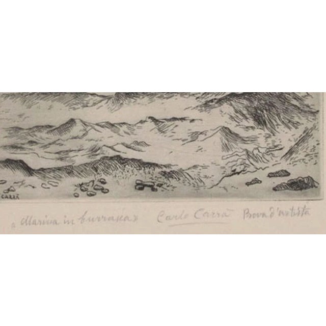 Marina in Burrasca is a splendid etching realized by Carlo Carrà (1881- 1966) in 1924. Hand-signed, titled and qualified...