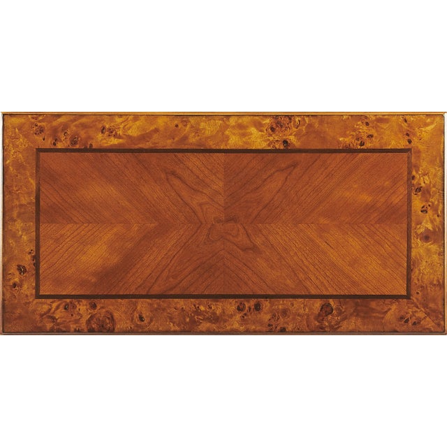 Selected solid Woods with choice cherry veneers. Four-way book matched cherry veneer top with inlayed walnut frame. Cherry...