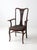 This antique Victorian wood chair features graceful lines, a carved backrest, and a black upholstered seat. Its timeless...