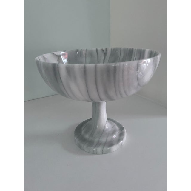 A smooth round open decorative fruit bowl or centerpiece. The clean modern look lends itself to many environments - from...