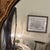 Beautiful Italian guilt, wood mirror, and the rococo taste of shield cartouche form with a campus foliage scrolls and...