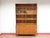 A beautiful Scandinavian display cabinet by Domino Mobler, this Danish teak piece offers both style and function, making...