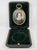 A lovely late Victorian to early Edwardian portrait of a lady, hand painted and housed in the original locket style frame...