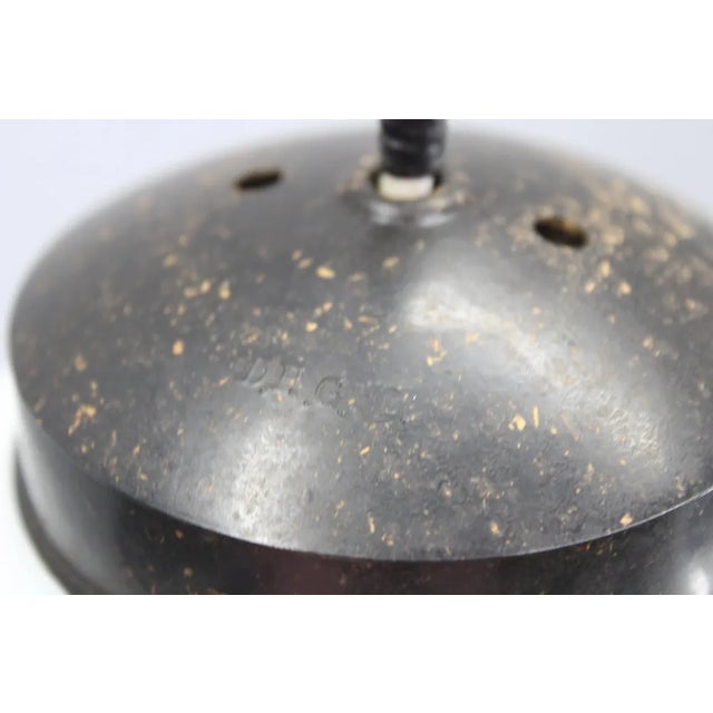 Vintage art deco pendant, from the years 1930, made in former Czechoslovakia. Made of plastic, brass and glass....