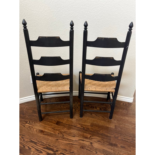 With timeless proportions and beautifully worn surfaces, this pair of vintage ladder-back chairs brings authentic Early...