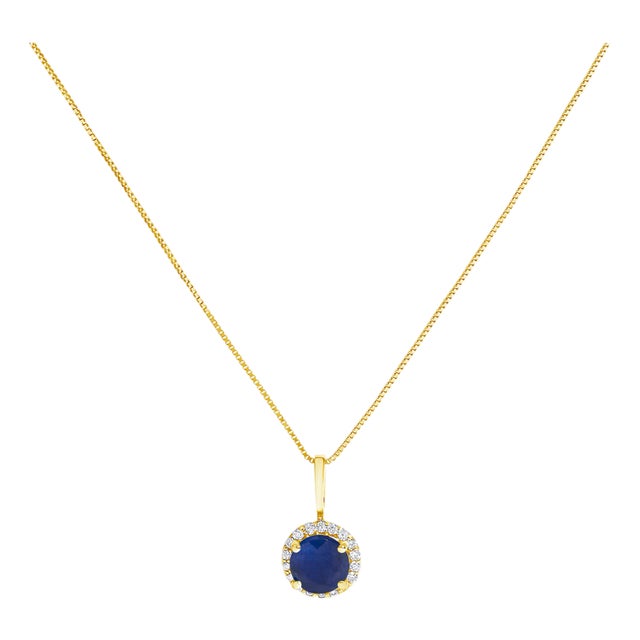 10K Yellow Gold Blue Sapphire and 1/10 Cttw Diamond Accent Halo Pendant Necklace For Sale