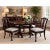 An elegant set of four vintage Maitland-Smith dining chairs, beautifully crafted in the Chippendale style and...
