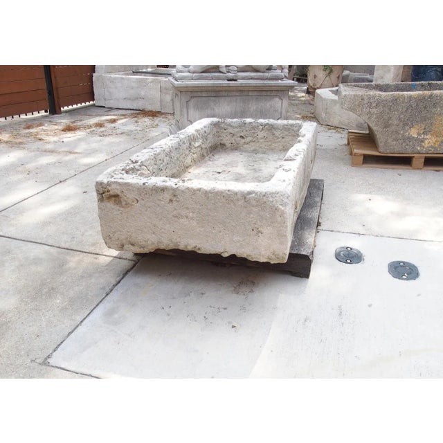 A Wide 18th Century Carved Limestone Trough From the South of France For Sale - Image 13 of 18