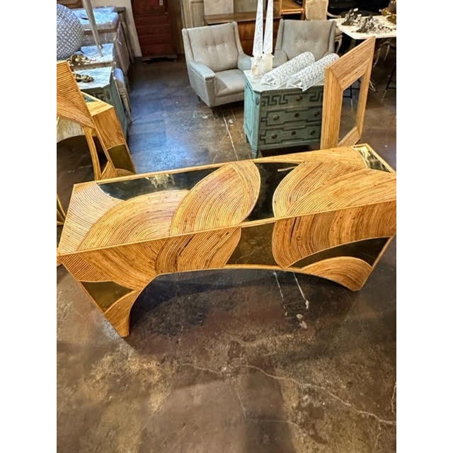 Handsome bamboo and brass consoles. A very unique piece that makes an interesting statement!!
