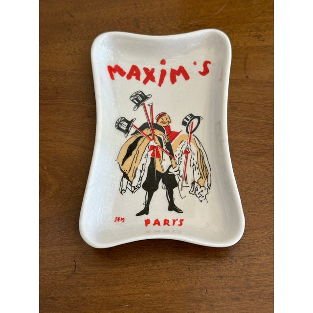 A delightful piece of Parisian dining history — a vintage ceramic catch-all dish from the legendary Maxim's de Paris,...