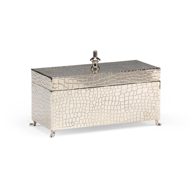 Solid brass with hide detail, hand made and nickel plated 6h x 9w x 4d