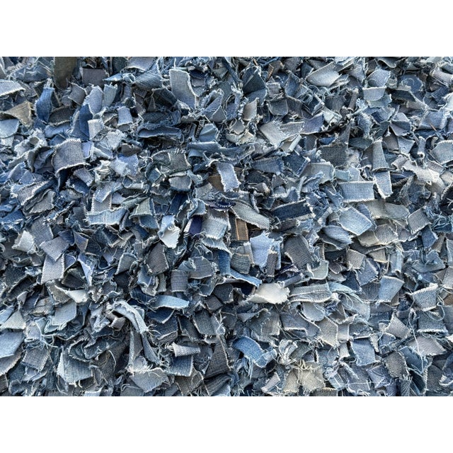 Design Plus Gallery presents the 8ft 3in x 13ft 8in Upcycled Denim Shag Area Rug from Stark. A creative and super cool rag...