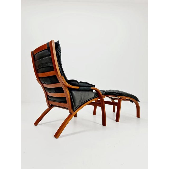Mid century Armchair and foot stool By Swedese 1960 : Beautiful Kaare Klint safari lounge chair , Crafted from solid wood...