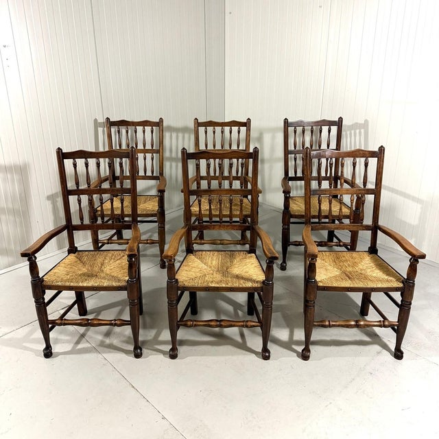 Set of 6 beautiful Lancashire dining chairs. Wooden frame with nice back rest, rush seat. 1900’s. In good condition with...