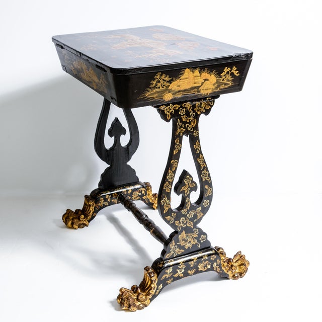This is an exceptional 19th-century Chinese export black lacquer sewing work table. This is a Chinese export black lacquer...