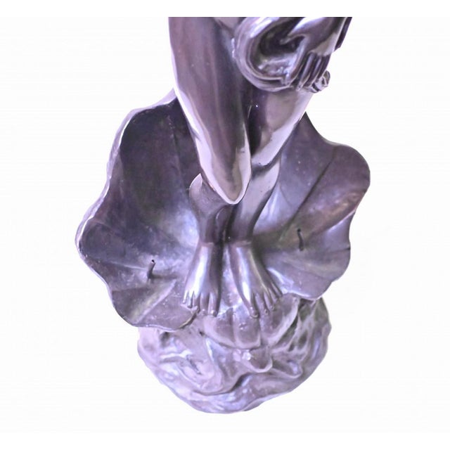 Stunning French bronze statue depicting a nude maiden standing in a rococo clam shell Piece is a fountain - water spouts...