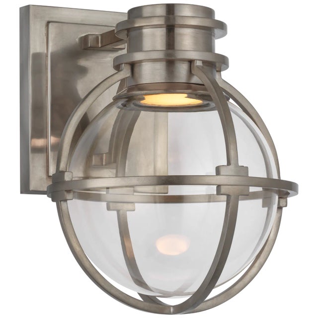 Gracie Single Sconce in Antique Nickel with Clear Glass Designer: Chapman & Myers Height: 8.75" Extension: 8.25"...