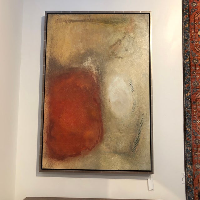 Silver gilt wood framed oil on canvas giclee, abstract in design, using colors of red and beige.