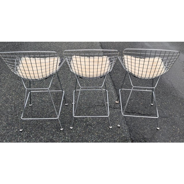 This Mid-Century Modern Chrome Wire Bar Stool offers an iconic silhouette inspired by the legendary designs of Harry...