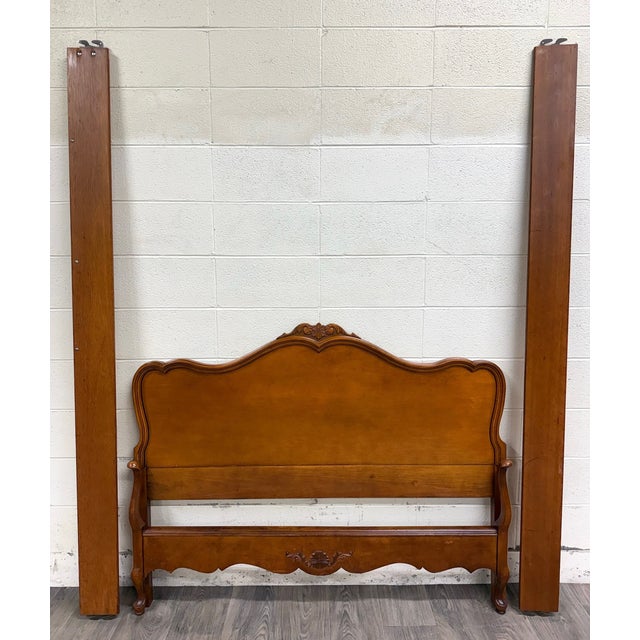 This is an absolutely beautiful vintage Full size French Provincial / Rococo Revival style bed. It features elegant...