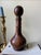 An authentic vintage mid-century Italian decanter wrapped in rich, hand-tooled leather featuring an embossed Fleur-de-Lis...