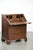 We are offering this elegant 18th-century antique English oak secretary desk with a beautiful stepped interior. This...