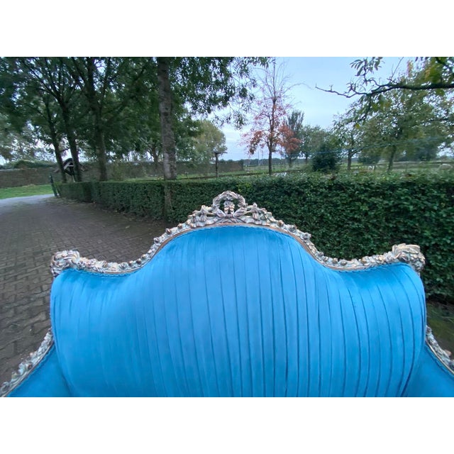 Bring timeless Parisian elegance into your home with this circa 1970 French Louis XVI–style settee, handcrafted in solid...