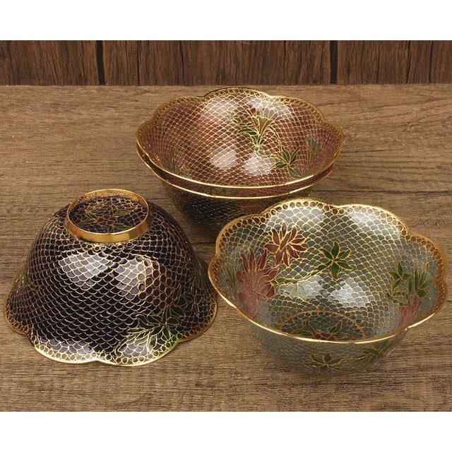 This is a striking set of four vintage cloisonné enamel bowls, crafted using the rare "eggshell" technique. Unlike...