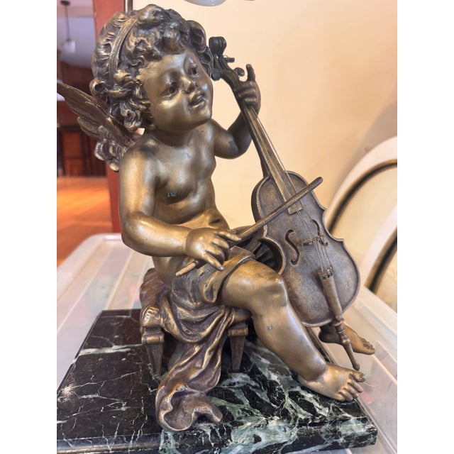 Lamps incorporating bronze sculptures became increasingly popular in the late 19th and early 20th centuries, blending...