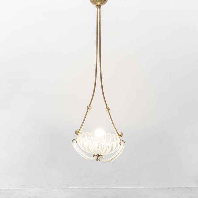 Pendant chandelier by Barovier & Toso. Brass frame with glass shade. Excellent condition. The item shows normal signs of...