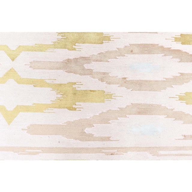 Infused with contemporary flair and crafted with time-honored techniques, this luxurious hand-knotted silk runner...