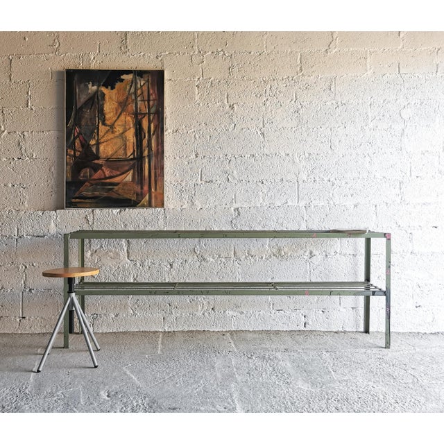 This metal shelf comes from a steel factory and has been used there since the 1950s. -Height lower level 36 cm -robust design