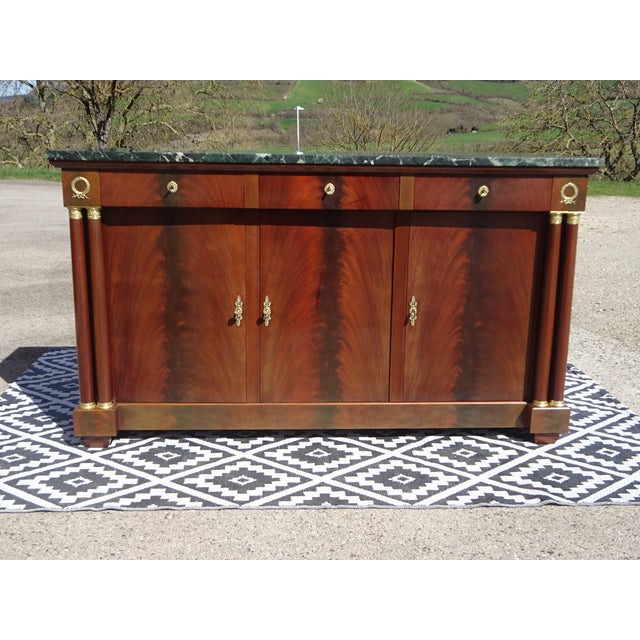 Beautiful and elegant 3-door, 3-drawer sideboard in flamed mahogany with a large 28mm thick sea-green marble top. Dark...