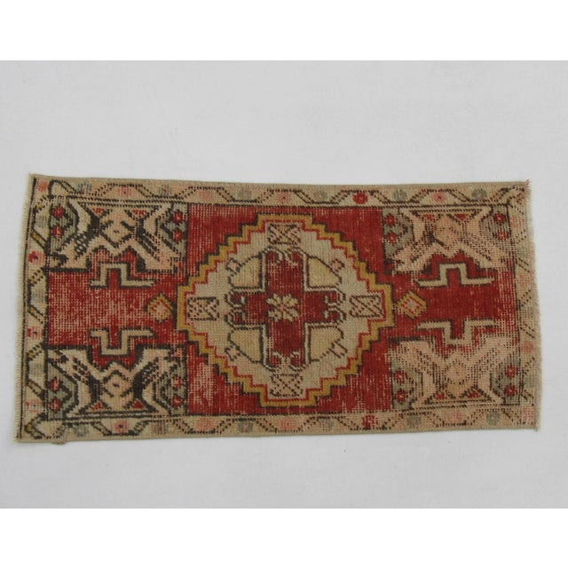 Vintage handknotted decorative mini rug from Konya region of Turkey. Approximately 50-60 years old. In very good condition.