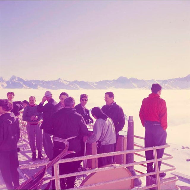 Mountain Top 1951 Skiers take in the mountain top view, Klosters, Switzerland, 1951. (Toni Frissell) Antoinette Frissell...