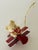 Vintage metal aero plane with plush toy teddy bear as Christmas Ornament.