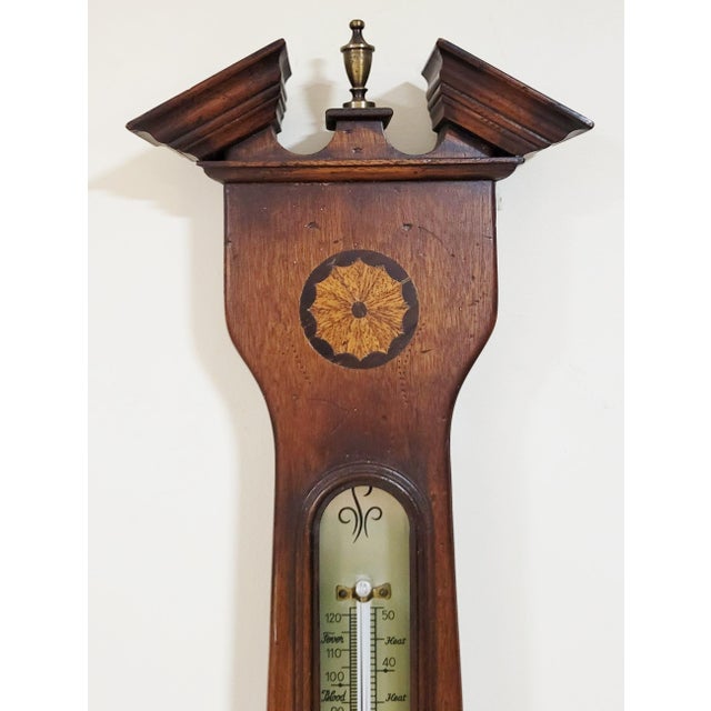 Fresh from a New York City estate, we have a pleasure to offer you this Vintage Mahogany English Style Barometer. Made mid...