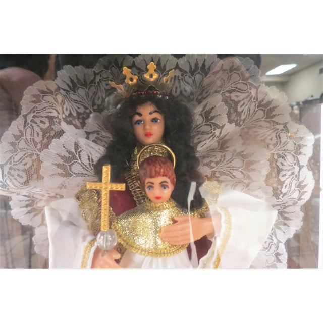 This stunning wax Madonna and child was imported from France. It dates to the turn of the century and the figurines sit in...