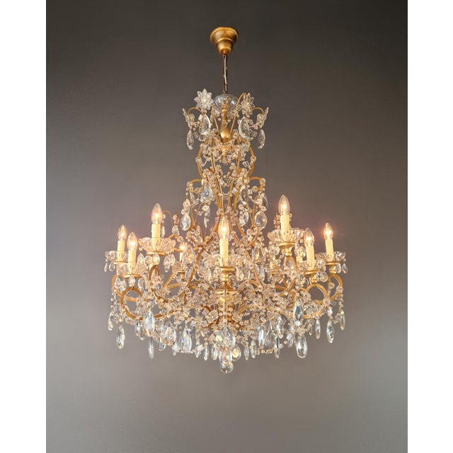 A magnificent antique Art Nouveau crystal chandelier. Carefully restored and ready for immediate use, this piece is a true...