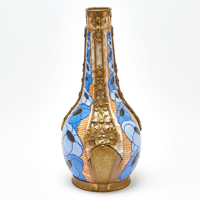 This exceptional French Art Deco stoneware vase, attributed to Louis Auguste Dage and dating to circa 1920, exemplifies...