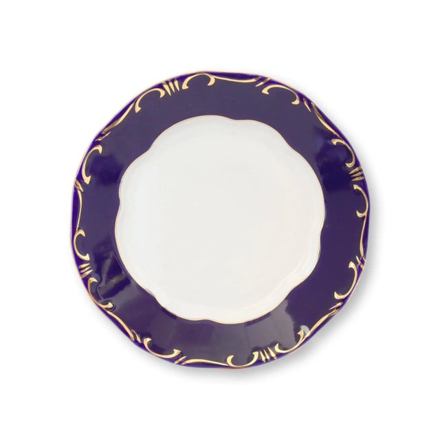 This set of eight Zsolnay Pompadour III Plates is a study in classic elegance. Each plate, measuring 9.25 inches,...